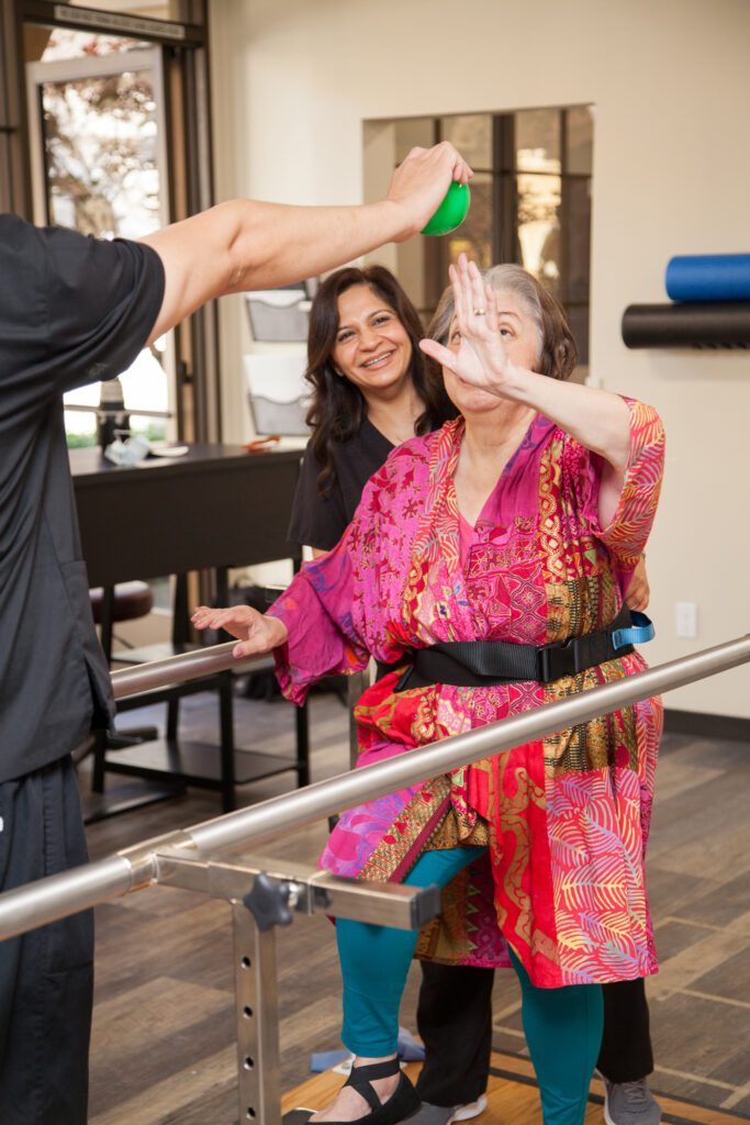 Physical therapist in Thousand Oaks helping a patient perform balance exercise.